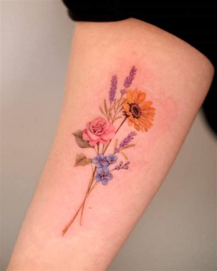 Unveil The Beauty And Meaning Of Daisy Bouquet Tattoos